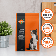 Orange and black package of Rose-Hip Vital Canine Equine supplement with a dog on a white surface.